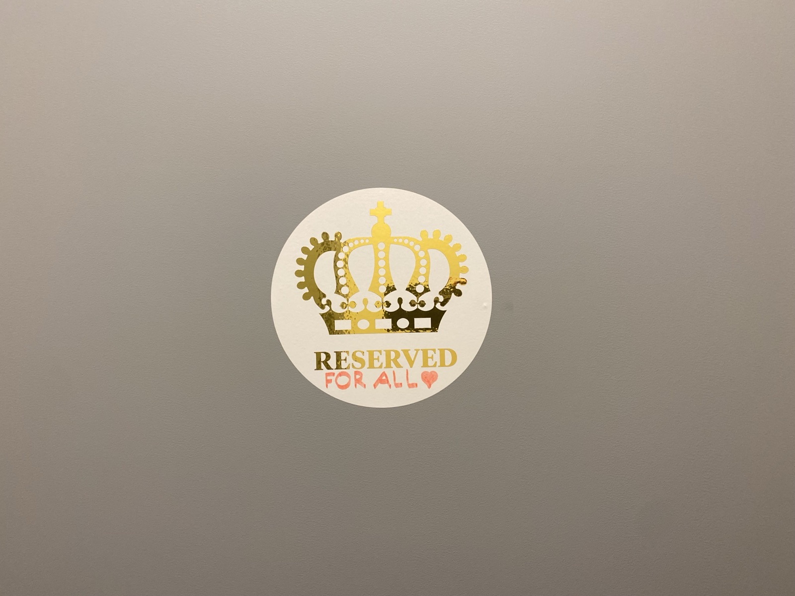 Round sticker with a gold crown and the word RESERVED, completed by hand with FOR ALL and a heart