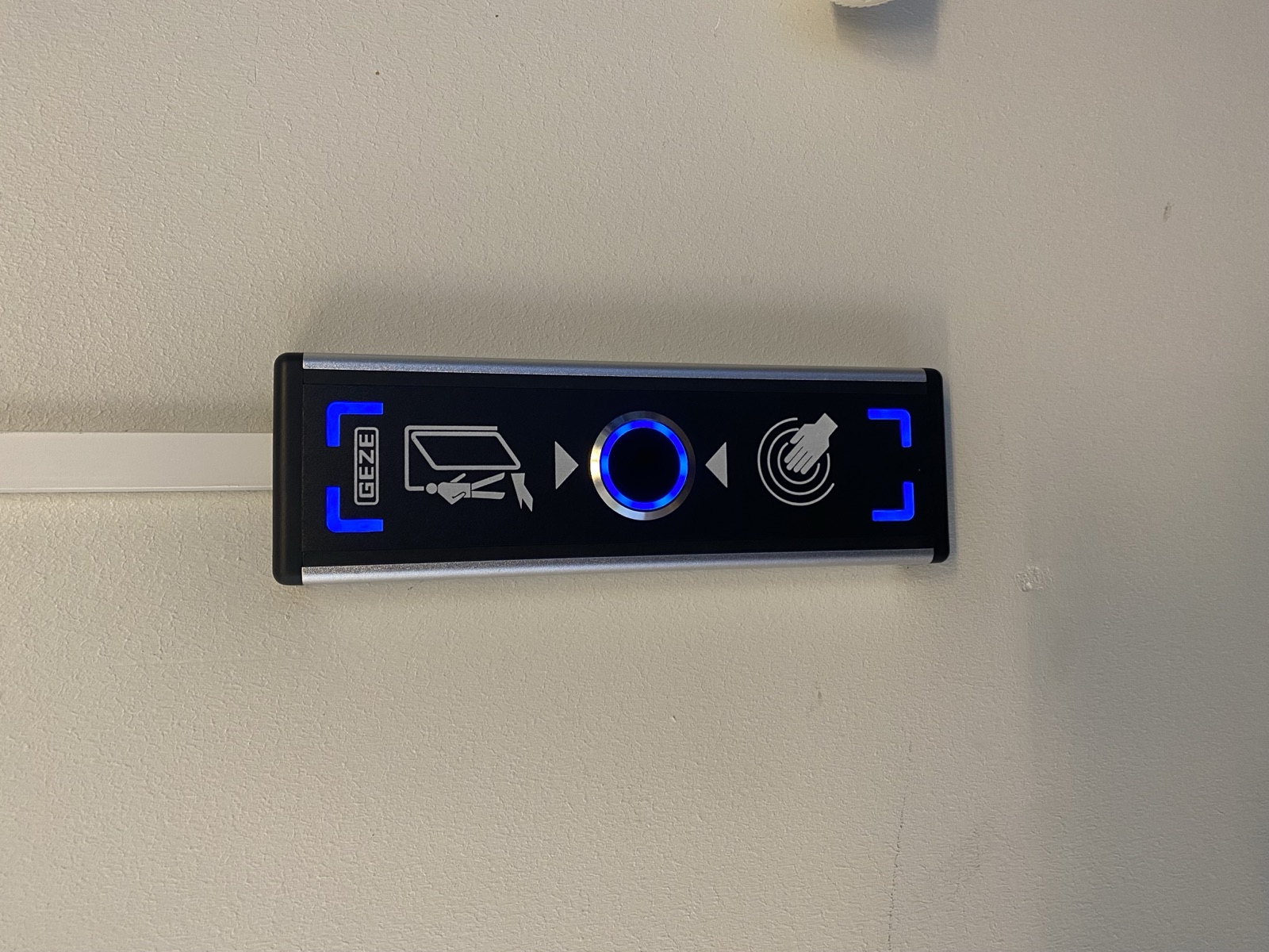 Door control panel with icons describing how the door swings and opens