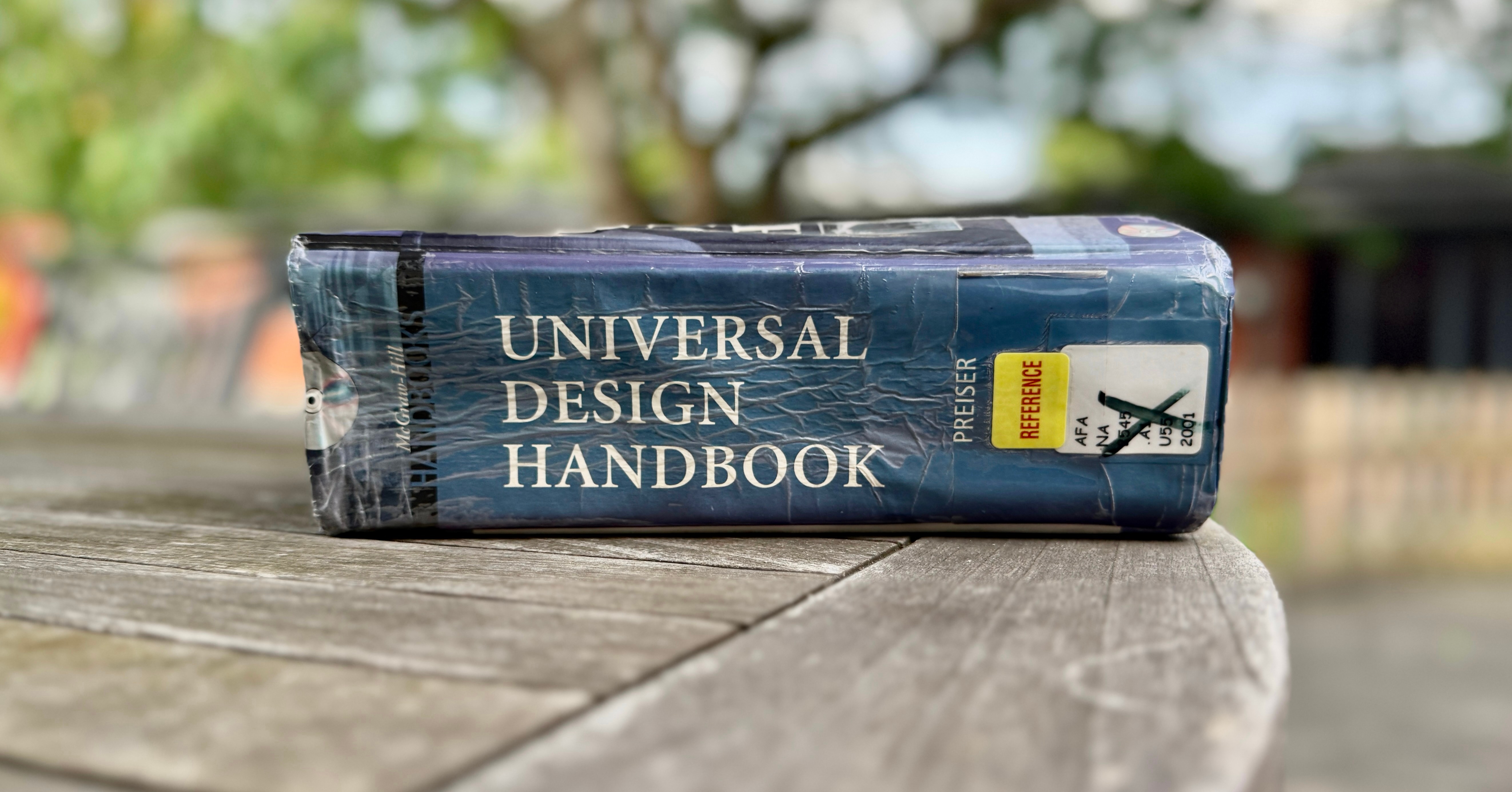 Picture 1. Summer. And my copy of the Universal Design Handbook.